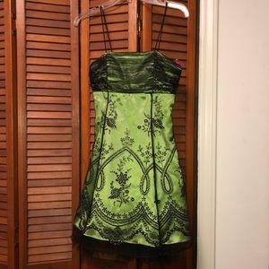 Beautiful green dress with black lace design